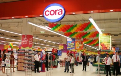 Cora reia investițiile în România